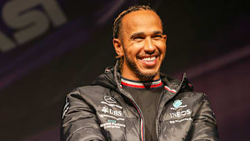 Lewis Hamilton is investing in a Chelsea takeover bid but has been a lifelong fan of a rival club