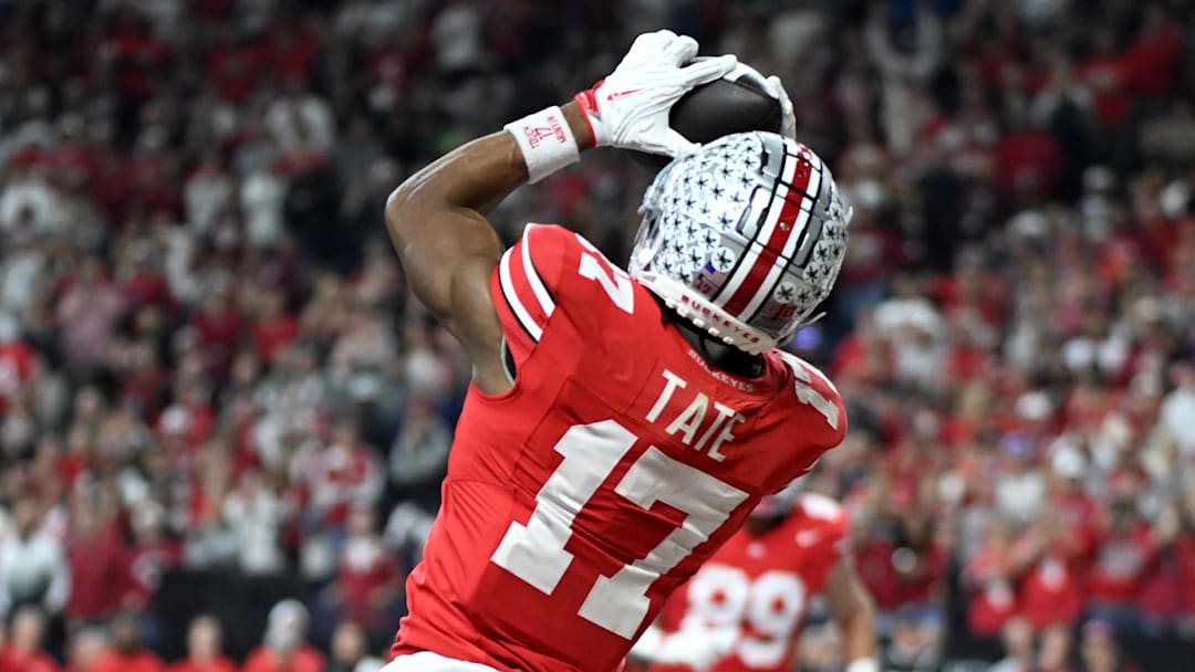 Dec 6, 2025; Indianapolis, IN, USA; Ohio State Buckeyes wide receiver Carnell Tate (17) scores a touchdown against the Indiana Hoosiers in the first quarter during the 2025 Big Ten championship game at Lucas Oil Stadium. Mandatory Credit: Robert Goddin-Imagn Images