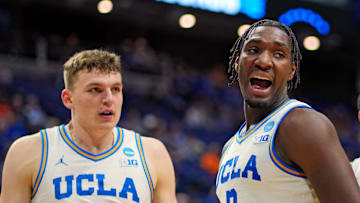 Mar 20, 2025; Lexington, KY, USA;  UCLA Bruins guard Eric Dailey Jr. (3) reacts during the second half against the Utah State Aggies in the first round of the NCAA Tournament at Rupp Arena. Mandatory Credit: Aaron Doster-Imagn Images