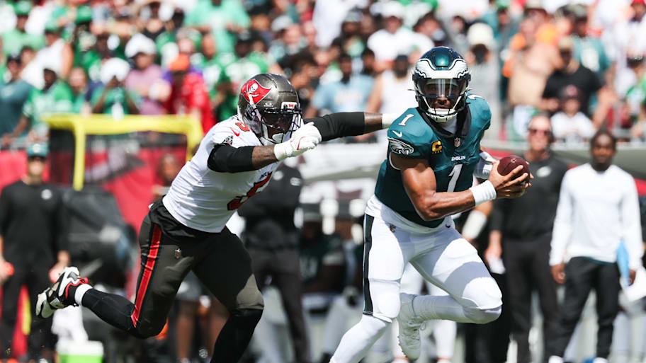 Jalen Hurts runs against the Buccaneers.