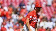 Aug 31, 2025; Cincinnati, Ohio, USA; Cincinnati Reds relief pitcher Emilio Pagan (15) reacts after the victory over the St. Louis Cardinals at Great American Ball Park. Mandatory Credit: Katie Stratman-Imagn Images