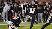 Nov 18, 2023; Columbia, Missouri, USA; Missouri Tigers place kicker Harrison Mevis (92) kicks the winning field goal against the Florida Gators during the second half at Faurot Field at Memorial Stadium. Mandatory Credit: Denny Medley-Imagn Images