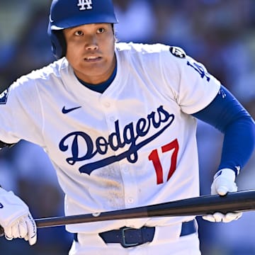 Aug 10, 2025; Los Angeles, California, USA; Los Angeles Dodgers designated hitter Shohei Ohtani (17) reacts after hitting a foul ball against the Toronto Blue Jays during the ninth inning at Dodger Stadium. Mandatory Credit: Jonathan Hui-Imagn Images