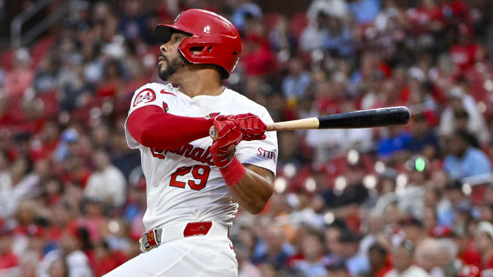 Aug 6, 2024; St. Louis, Missouri, USA;  St. Louis Cardinals left fielder Tommy Pham (29) hits a two run home run against the Tampa Bay Rays during the second inning at Busch Stadium. Mandatory Credit: Jeff Curry-USA TODAY Sports