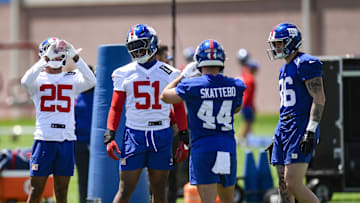 May 10, 2025; East Rutherford, NJ, USA; New York Giants cornerback Korie Black (25), linebacker Abdul Carter (51), running back Cam Skattebo (44) and tight end Thomas Fidone II (86) chat during rookie minicamp at Quest Diagnostics Training Center. Mandatory Credit: John Jones-Imagn Images