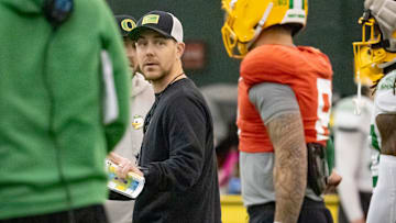 Oregon offensive coordinator and quarterbacks coach Will Stein works with the team as the Oregon Ducks practice ahead of the Rose Bowl Friday, Dec. 27, 2024, at the Moshofsky Center in Eugene, Ore.