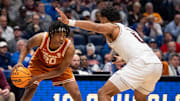 Texas Longhorns guard Tre Johnson (20) looks to pass during their second round game of the SEC Men's Basketball Tournament at Bridgestone Arena in Nashville, Tenn., Thursday, March 13, 2025.