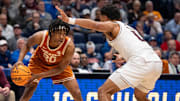 Texas Longhorns guard Tre Johnson (20) looks to pass during their second round game of the SEC Men's Basketball Tournament at Bridgestone Arena in Nashville, Tenn., Thursday, March 13, 2025.