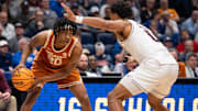 Texas Longhorns guard Tre Johnson (20) looks to pass during their second round game of the SEC Men's Basketball Tournament at Bridgestone Arena in Nashville, Tenn., Thursday, March 13, 2025.