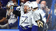 Dec 8, 2022; Tampa, Florida, USA; Tampa Bay Lightning center Brayden Point (21) is congratulated by center Anthony Cirelli (71) after he scores a goal against the Nashville Predators during the third period at Amalie Arena. Mandatory Credit: Kim Klement-Imagn Images