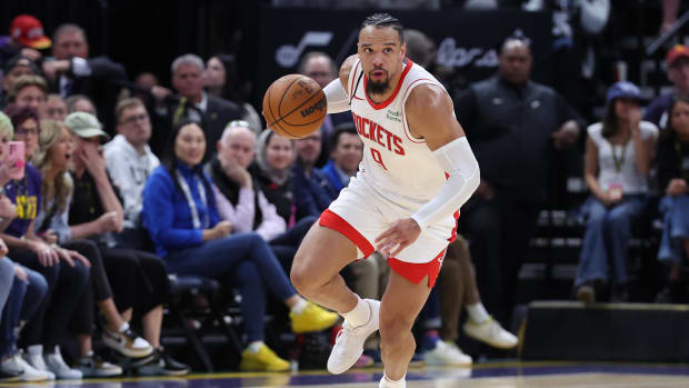 Apr 11, 2024; Salt Lake City, Utah, USA; Houston Rockets forward Dillon Brooks (9) brings the ball up