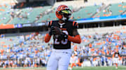 Oct 5, 2025; Cincinnati, Ohio, USA; Cincinnati Bengals cornerback Cam Taylor-Britt (29) warms up before a game against the Detroit Lions at Paycor Stadium. Mandatory Credit: Katie Stratman-Imagn Images