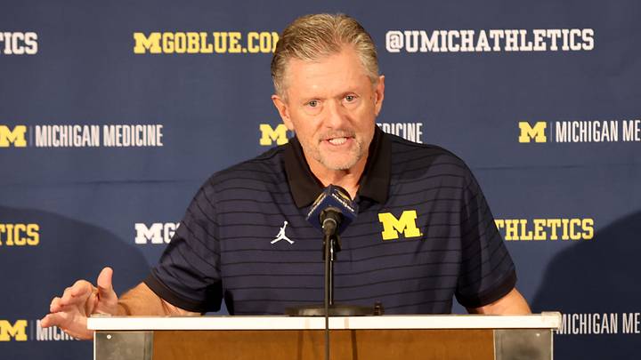 Kyle Whittingham speaks at a news conference introducing him as the new Michigan Wolverines head football coach at the Hyatt Regency Orlando on December 28, 2025 in Orlando, Florida.