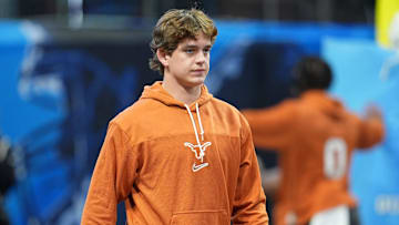 Jan 1, 2025; Atlanta, GA, USA; Texas Longhorns quarterback Arch Manning (16) warms up before the Peach Bowl at Mercedes-Benz Stadium.