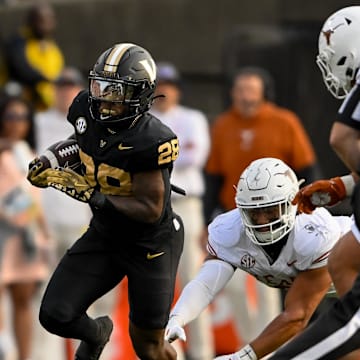 Oct 26, 2024; Nashville, Tennessee, USA;  Vanderbilt Commodores running back Sedrick Alexander (28) runs the ball against the Texas Longhorns during the first half at FirstBank Stadium. Mandatory Credit: Steve Roberts-Imagn Images