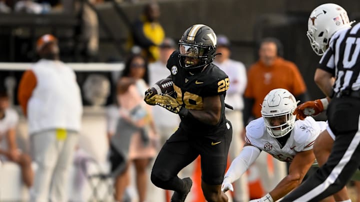 Oct 26, 2024; Nashville, Tennessee, USA;  Vanderbilt Commodores running back Sedrick Alexander (28) runs the ball against the Texas Longhorns during the first half at FirstBank Stadium. Mandatory Credit: Steve Roberts-Imagn Images