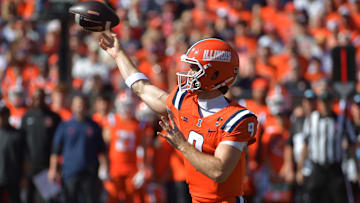 Oct 11, 2025; Champaign, Illinois, USA; Illinois Fighting Illini quarterback Luke Altmyer (9) throws during the first quarter against the Ohio State Buckeyes at Memorial Stadium. Mandatory Credit: Ron Johnson-Imagn Images
