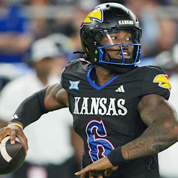 Sep 13, 2024; Kansas City, Kansas, USA; Kansas Jayhawks quarterback Jalon Daniels (6) throws a pass during the second half against the UNLV Rebels at Children's Mercy Park. Mandatory Credit: Jay Biggerstaff-Imagn Images