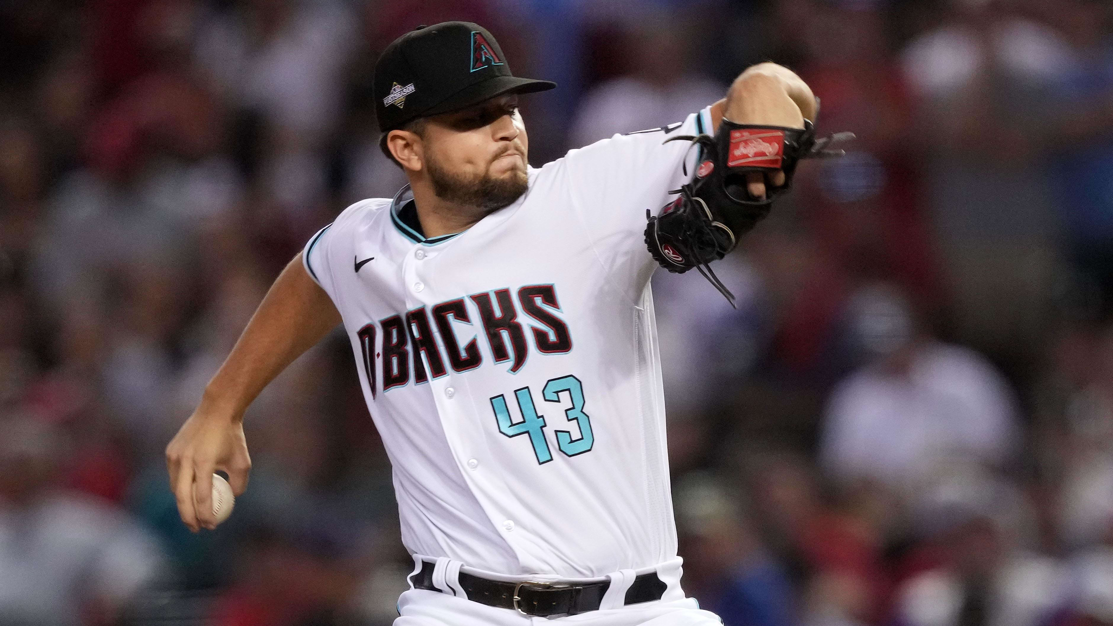 Arizona Diamondbacks starting pitcher Slade Cecconi (43) throws in Game 5 of the National League Championship Series.