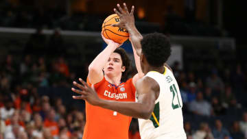 Mar 24, 2024; Memphis, TN, USA; Clemson Tigers forward Ian Schieffelin (4) shoots against Baylor Bears center Yves Missi (21) in the first half in the second round of the 2024 NCAA Tournament at FedExForum.