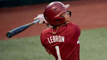 Feb 14, 2025; Tuscaloosa, AL, USA; Justin Lebron drives in a run with a sacrifice fly during Alabama baseball’s opening day at Sewell-Thomas Stadium against Bradley. The Crimson Tide defeated Bradley 10-6.