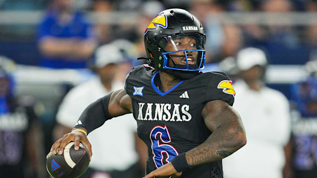 Sep 13, 2024; Kansas City, Kansas, USA; Kansas Jayhawks quarterback Jalon Daniels (6) throws a pass during the second half ag