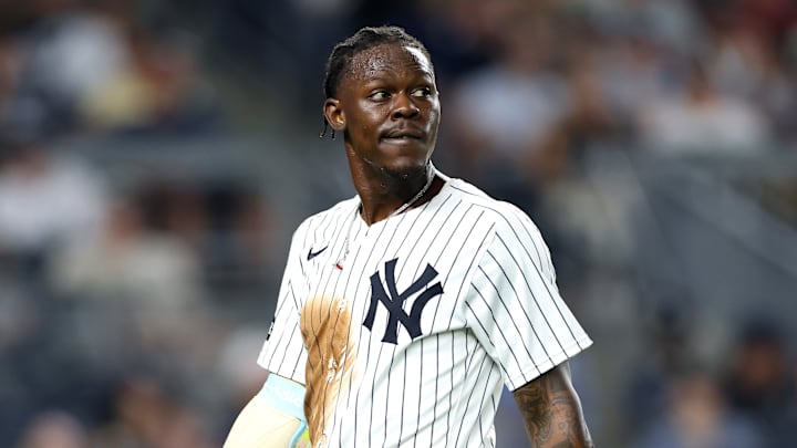 New York Yankee Third Basemen Jazz Chisholm walks off the field in a game vs the Boston Red Sox