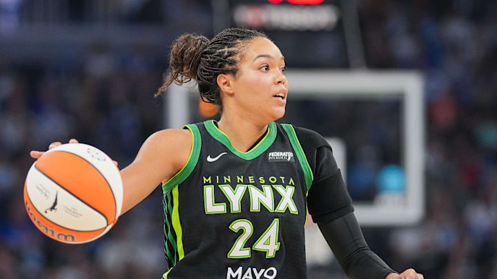 Jul 30, 2025; Minneapolis, Minnesota, USA; Minnesota Lynx forward Napheesa Collier (24) dribbles against the New York Liberty in the second quarter at Target Center. Mandatory Credit: Brad Rempel-Imagn Images