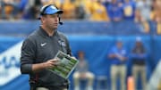 Sep 6, 2025; Pittsburgh, Pennsylvania, USA;  Pittsburgh Panthers offensive coordinator Kade Bell looks on during the first quarter against the Central Michigan Chippewas at Acrisure Stadium. Mandatory Credit: Charles LeClaire-Imagn Images