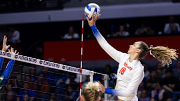 Florida Gators outside hitter Kennedy Martin (18) hits the ball during the first set against the FGCU Eagles in the first round of the NCAA Women   s Volleyball Championship at Exactech Arena at the Stephen C. O'Connell Center in Gainesville, FL on Thursday, November 30, 2023. [Matt Pendleton/Gainesville Sun]