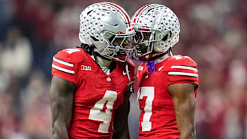 Ohio State wide receivers Jeremiah Smith and Carnell Tate celebrate a big play in the Big Ten championship. 