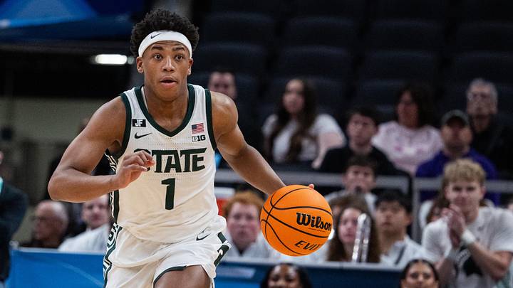 Mar 15, 2025; Indianapolis, IN, USA; Michigan State Spartans guard Jeremy Fears Jr. (1) dribbles the ball  in the first half against the Wisconsin Badgers at Gainbridge Fieldhouse. Mandatory Credit: Trevor Ruszkowski-Imagn Images