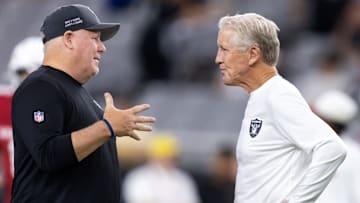 Aug 23, 2025; Glendale, Arizona, USA; Las Vegas Raiders offensive coordinator Chip Kelly (left) with head coach Pete Carroll against the Arizona Cardinals during a preseason NFL game at State Farm Stadium. Mandatory Credit: Mark J. Rebilas-Imagn Images