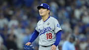 Oct 31, 2025; Toronto, Ontario, CAN; Los Angeles Dodgers pitcher Yoshinobu Yamamoto (18) reacts in the sixth inning against the Toronto Blue Jays during game six of the 2025 MLB World Series at Rogers Centre. Mandatory Credit: John E. Sokolowski-Imagn Images
