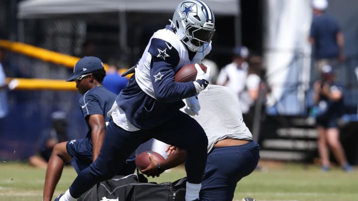 Jul 31, 2024; Oxnard, CA, USA; Dallas Cowboys running back Ezekiel Elliott (15) runs during training camp at the River Ridge Playing Fields in Oxnard, California. 