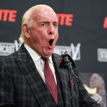 Ric Flair exclaims his trademark WOOO at his Last Match press conference.