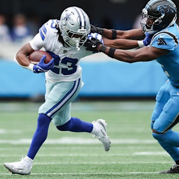 Dallas Cowboys running back Jaydon Blue runs with the ball during the second quarter against the Carolina Panthers.