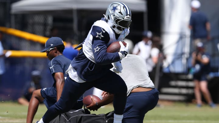 Jul 31, 2024; Oxnard, CA, USA; Dallas Cowboys running back Ezekiel Elliott (15) runs during training camp at the River Ridge Playing Fields in Oxnard, California.  Mandatory Credit: Jason Parkhurst-USA TODAY Sports