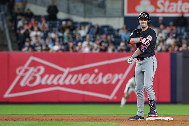 Lane Thomas reacts after hitting an RBI double 