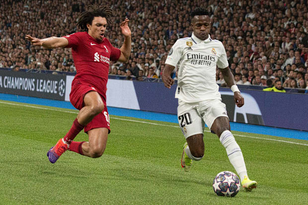 Trent Alexander-Arnold (left) and Vinicius Junior on opposite teams.