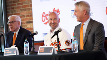 Nov 4, 2025; Baltimore, MD, USA; From left to right: Baltimore Orioles Owner David Rubenstein, Baltimore Orioles Manager Craig Albernaz and President of Baseball Operations Mike Elias address the audience during a press conference at Warehouse Bar. Mandatory Credit: Daniel Kucin Jr.-Imagn Images