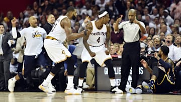 Apr 17, 2017; Cleveland, OH, USA; Cleveland Cavaliers center Tristan Thompson (13) and guard Iman Shumpert (4) react to a call as Indiana Pacers forward Paul George (13) complains from the floor during the second half in game two of the first round of the 2017 NBA Playoffs at Quicken Loans Arena. The Cavs won 117-111. Mandatory Credit: Ken Blaze-Imagn Images