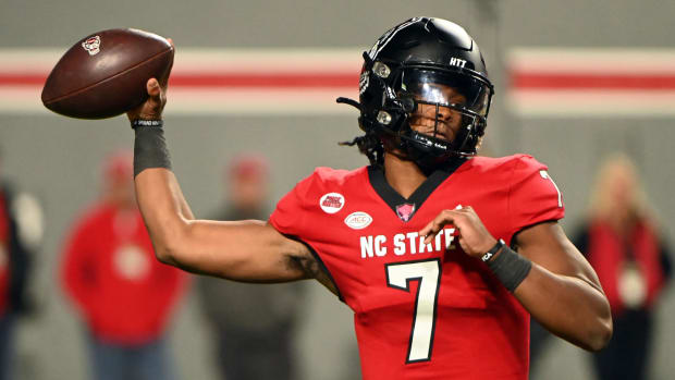 North Carolina State Wolfpack quarterback MJ Morris (7) throws a pass during the first half against the Miami Hurricanes