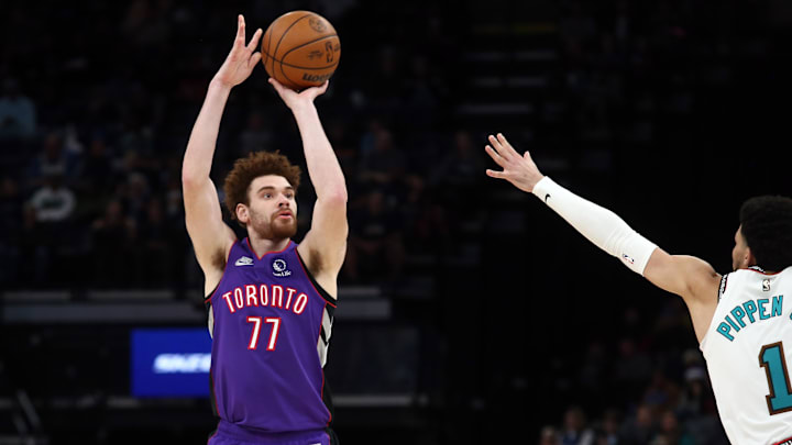 Dec 26, 2024; Memphis, Tennessee, USA; Toronto Raptors forward Jamison Battle (77) shoots during the third quarter against the Memphis Grizzlies at FedExForum. Mandatory Credit: Petre Thomas-Imagn Images