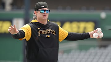 Apr 19, 2025; Pittsburgh, Pennsylvania, USA;  Pittsburgh Pirates hitting coach Matt Hague (52) gestures during batting practice against theCleveland Guardians at PNC Park. Mandatory Credit: Charles LeClaire-Imagn Images