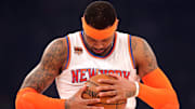 Apr 6, 2017; New York, NY, USA; New York Knicks small forward Carmelo Anthony (7) inspects the ball before a game against the Washington Wizards at Madison Square Garden. Mandatory Credit: Brad Penner-Imagn Images