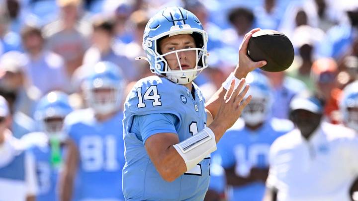 Oct 4, 2025; Chapel Hill, North Carolina, USA; North Carolina Tar Heels quarterback Max Johnson (14) looks to pass in the second quarter at Kenan Stadium. Mandatory Credit: Bob Donnan-Imagn Images