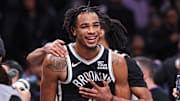 Feb 7, 2025; Brooklyn, New York, USA; Brooklyn Nets center Nic Claxton (33) celebrates with teammates after defeating the Miami Heat at Barclays Center. Mandatory Credit: Vincent Carchietta-Imagn Images