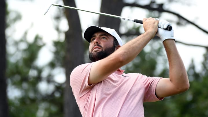 Aug 23, 2024; Castle Rock, Colorado, USA; Scottie Scheffler hits his tee shot on the 11th hole during the second round of the BMW Championship golf tournament at Castle Pines Golf Club. Mandatory Credit: Christopher Hanewinckel-USA TODAY Sports