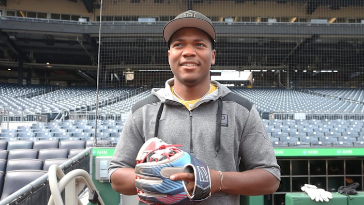 Jul 29, 2022; Pittsburgh, Pennsylvania, USA; Pittsburgh Pirates first round draft pick Termarr Johnson,  the fourth overall player drafted in the 2022 MLB Draft, enters the dugout for batting practice before the Pirates host the Philadelphia Phillies at PNC Park. Mandatory Credit: Charles LeClaire-USA TODAY Sports